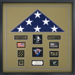 Flag Display Case With Military Memorabilia Commemorates Deployment