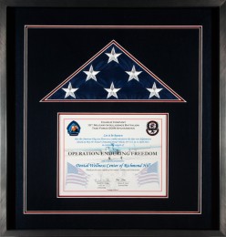 Flag Display Case That Contains A Flag Flown By The 15th Military Intelligence Battalion