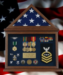 Retirement Flag Display Case Examples With a U.S. Flag And Navy Memorabilia.